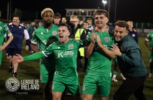 12 September 2025; Kerry FC players, from left, Okwuy Okwute, Sean McGrath, and Cian Brosnan celebrate after the Sports Direct Mens FAI Cup quarter-final match between Kerry FC and Sligo Rovers at Mounthawk Park in Tralee, Kerry. Photo by Michael P Ryan/Sportsfile
